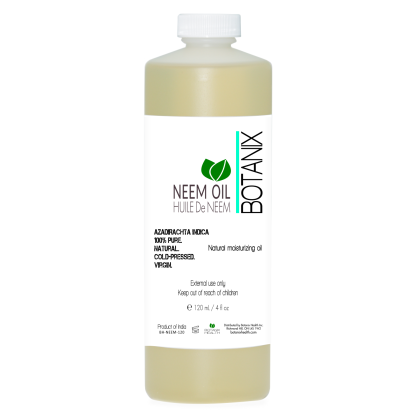 Neem oil in clear bottle with white cap